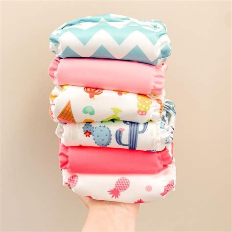 Infografic comparativ: Avantajele scutecelor de unică folosință vs. scutecele textile