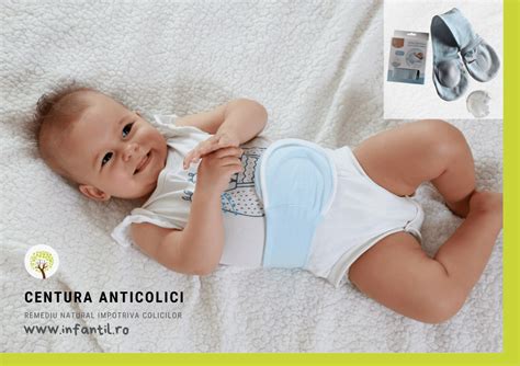 ilustrație cu un bebeluș fericit purtând o centură anticolici cu sâmburi de cireșe