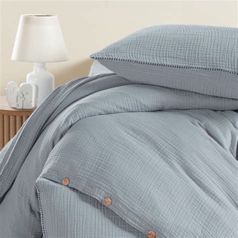 Comparație vizuală a fibrelor de bumbac organic și muselină