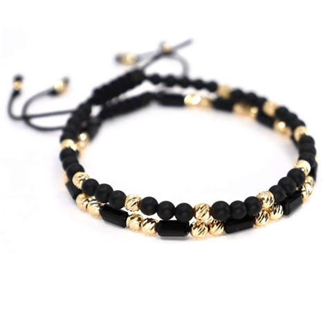 Catalog cu modele de brățări din aur 14K cu diverse tipuri de șnururi colorate, disponibile la Doremavix.