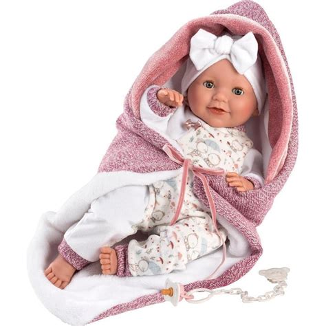 Ilustrație comparativă: o păpușă Llorens autentică alături de o imitație de calitate inferioară