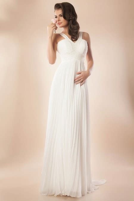 Exemplu de rochie stil empire, cu talia sub bust, care avantajează silueta de gravidă